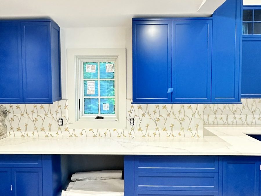 Blue Kitchen with Patterned Tile Backsplash