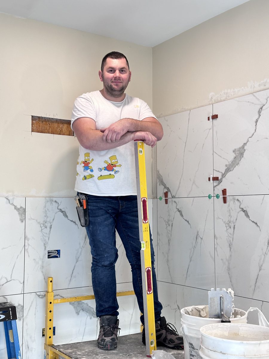Checking Level on a Marble Tile Wall