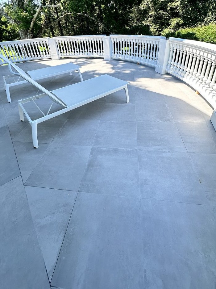 Porcelain terrace pavers laid across an outdoor patio